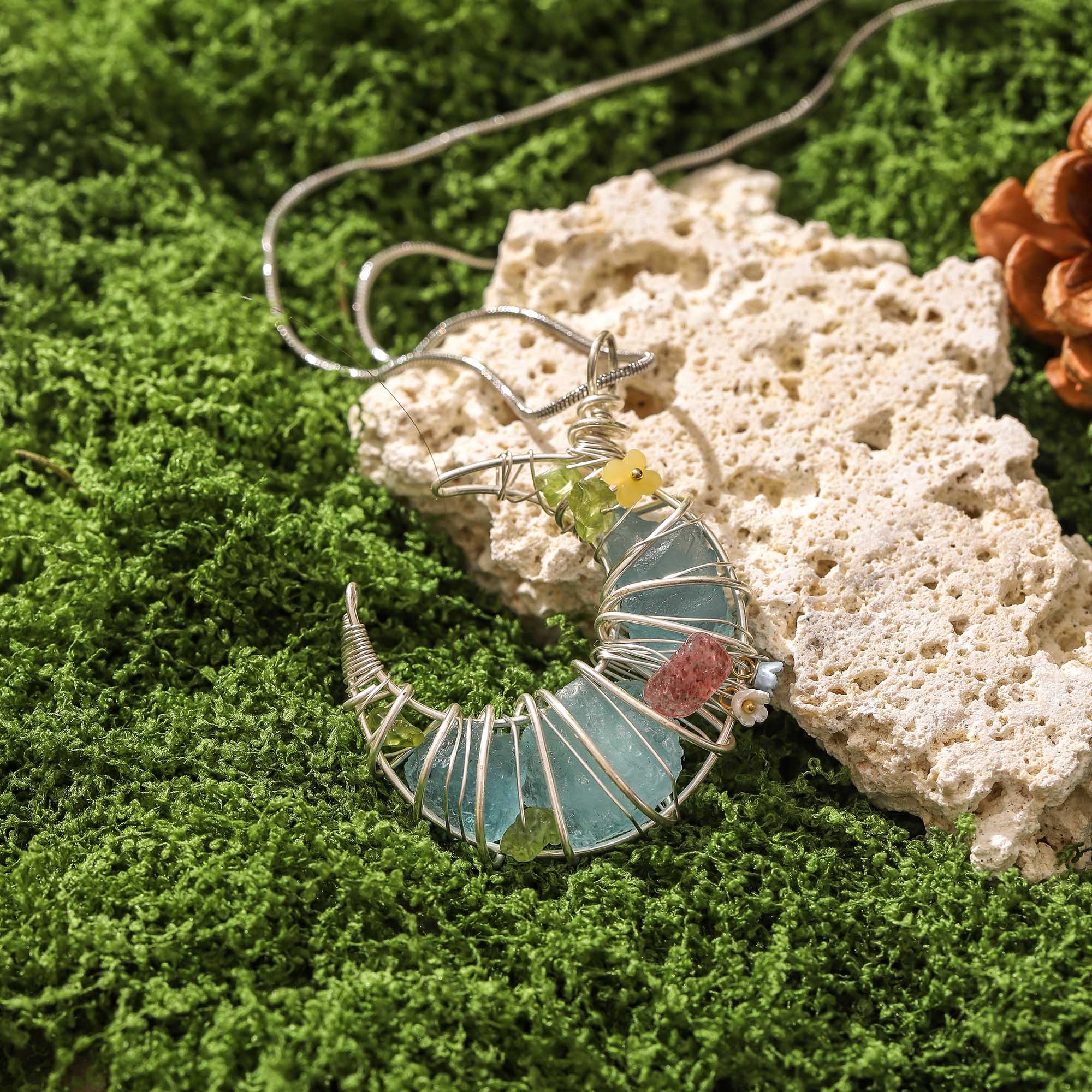 Moonlight Dreamweaver – Blue Crystal Crescent Pendant