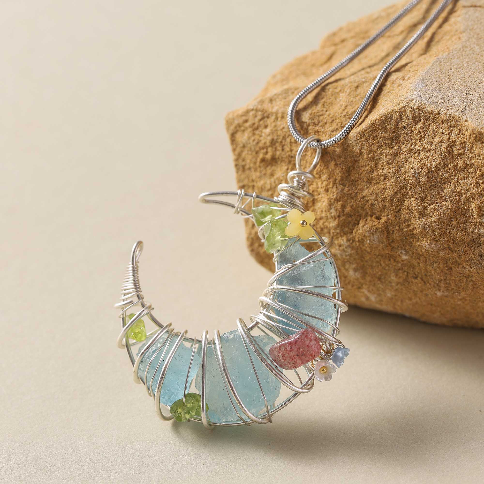 Moonlight Dreamweaver – Blue Crystal Crescent Pendant