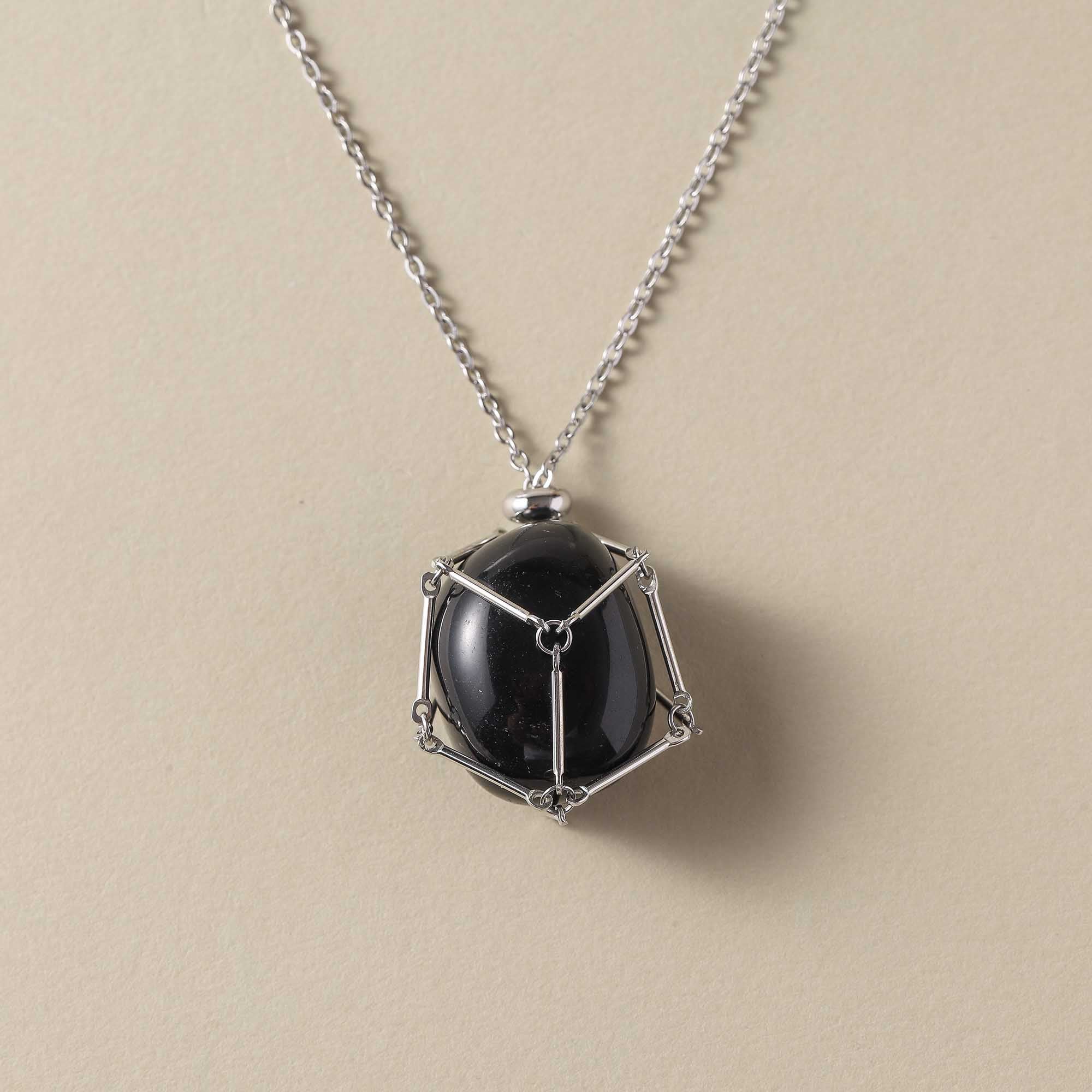 Nightshade Guardian – Obsidian Cage Necklace