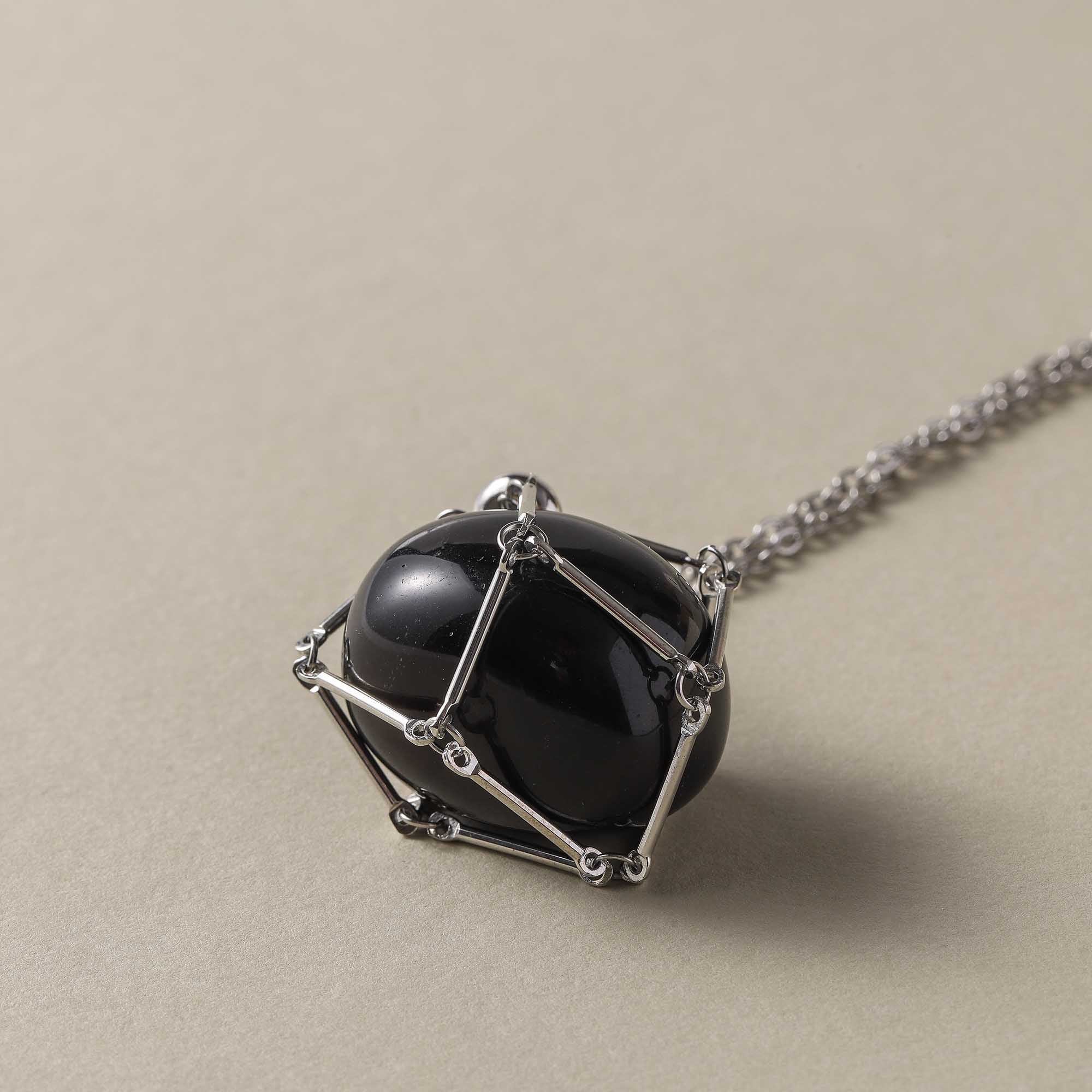 Nightshade Guardian – Obsidian Cage Necklace